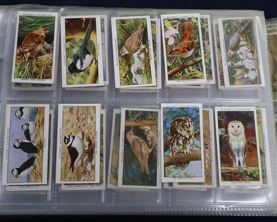 Three albums of cigarette cards